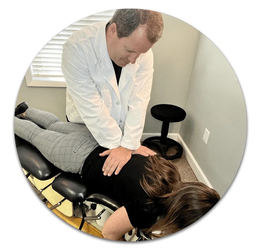 Chiropractor Vienna VA Gary Blabey With Patient How Chiropractic Care Can Help